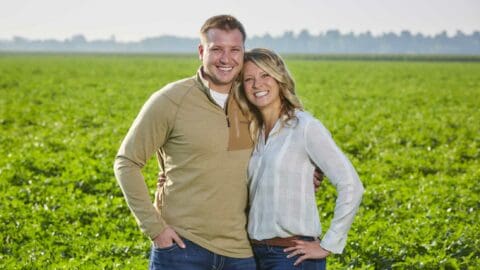 Nuto Farms children standing in potato field