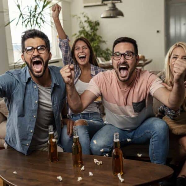 Friends watching sport on tv