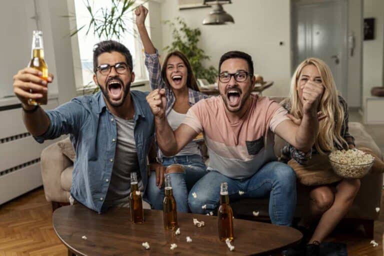 Friends watching sport on tv